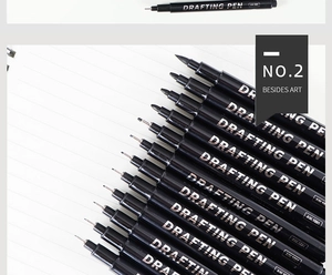 Detailed close-up showing various needle tip sizes of professional black drafting pens