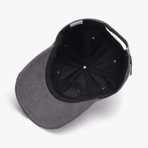 Deep grey cotton baseball cap showing internal lining, stitching, and adjustable strap