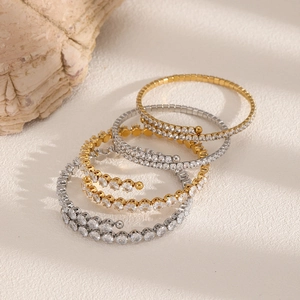 Set of four stainless steel open bangles with full cubic zirconia stones in gold and silver