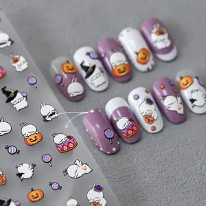 Detail of 5D Halloween nail stickers featuring bunnies, pumpkins and wizard hats