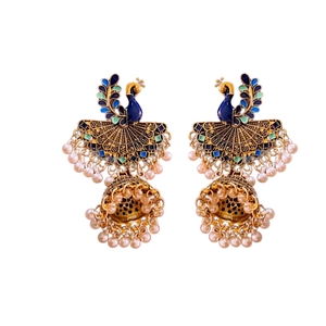 Vintage peacock tassel drop earrings with blue enamel and golden beads on white background