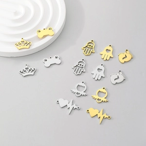 DIY stainless steel charms in gold and silver finish featuring crown and heart designs