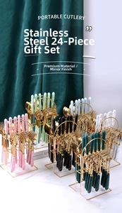 Polished 24-piece stainless steel cutlery set with marble texture handles and gold storage rack