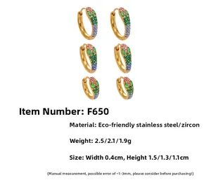 Three pairs of gold stainless steel hoops with pink, green, and blue zircon in three sizes