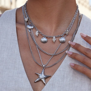 Three-layer silver stainless steel necklace with shell, conch, and starfish pendants
