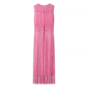 Detail of pink knitted sleeveless dress featuring long fringe tassels on the skirt