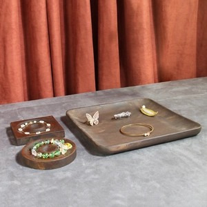 Retro walnut wooden jewelry display set with tiered trays and velvet backdrop