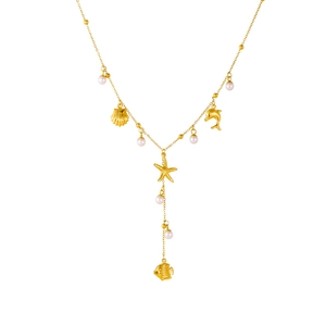 Minimalist gold Y-shape necklace with starfish, dolphin, and sea shell charms with pearls