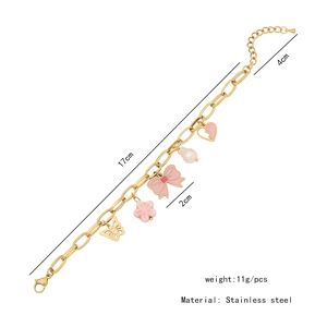 Detail of pink tulip and butterfly charms on a stainless steel gold necklace with dimensions