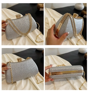 Detail view of silver glitter evening clutch with gold chain strap and diamond buckle