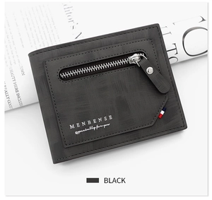 Detail showing matte texture and metallic zipper of this black minimalist men wallet