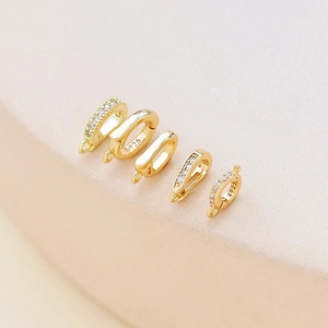 Detailed close-up of S925 gold plated connector clasps with micro-set zircon stones
