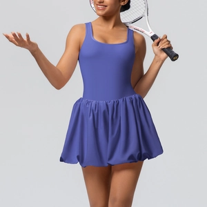 Close-up of periwinkle blue athletic tennis dress featuring pleated skirt and racerback