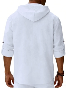 Detail of men's white linen hooded shirt showing back view and natural fabric texture