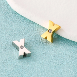 Polished stainless steel letter X pendant with zircon in gold and silver finishes