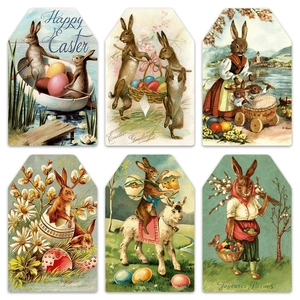 Detail of vintage Easter paper tags with colorful rabbit and egg illustrations
