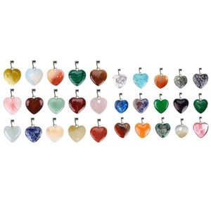 Macro shot of assorted heart-shaped stone pendants with metal bails in various colors
