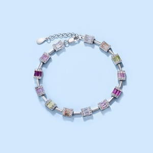 Macro view of S925 silver tennis bracelet with colorful square zircon stones and lobster clasp