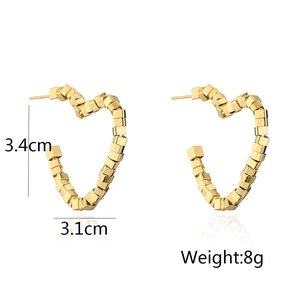 Detailed view of gold plated heart earrings showing 3.4cm height and 3.1cm width dimensions