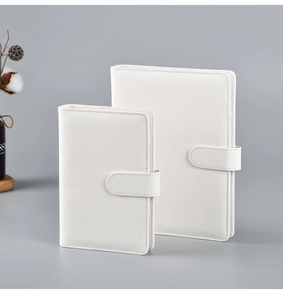 Detailed view of two white macaron A5 A6 PU leather loose-leaf notebook covers with clasps
