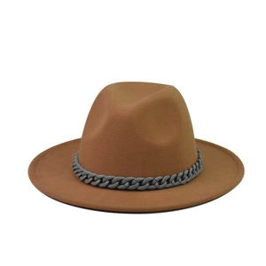 Close-up of camel wool felt boater hat featuring a decorative grey resin chain band