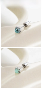 Detailed view of 5mm dragon claw ear studs with light blue and mint green beads