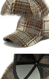 Detail showing the plaid pattern texture and reinforced stitching of this baseball cap