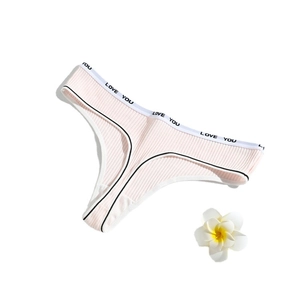 Pink ribbed cotton thong for women with LOVE YOU elastic waistband on white background