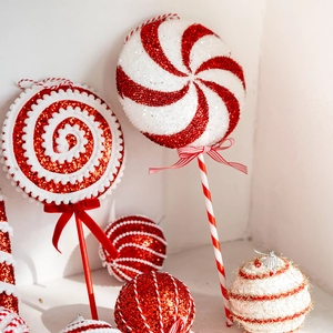 Red and white sequined Christmas lollipop and ball ornaments for holiday tree decoration