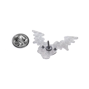 Silver bat-shaped alloy brooch with geometric honeycombed pattern and butterfly clutch back