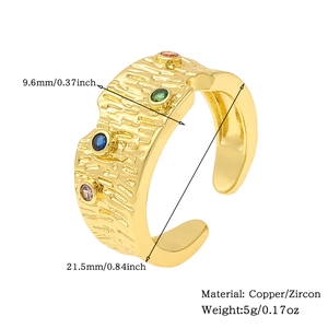 Detailed view of golden copper ring with colorful zircons and size specifications