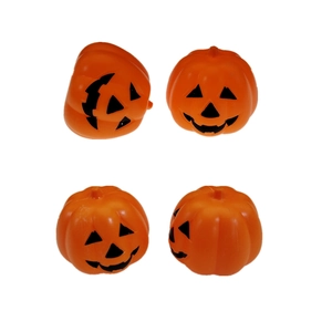 Detailed view of four orange Halloween plastic pumpkins with spooky black smiling faces