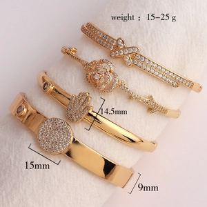 Set di bracciali vintage placcati oro con ciondoli in zircone, occhio e rose
