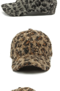 Detailed view of leopard print teddy fleece baseball caps in grey and brown colors