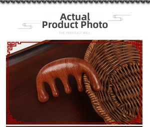 Macro detail of natural red sandalwood 5-tooth scalp massage comb on wooden tray