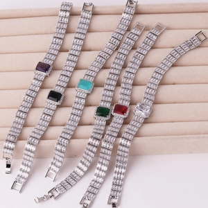 Luxurious wide rectangle zircon bracelets with multi-color stones on pink velvet tray