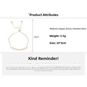 Detail of adjustable gold-plated bracelet with white pearls and sparkling zircon accents