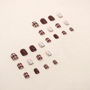 Caramel brown rabbit press-on nails with plaid pattern and cute cartoon bunny design