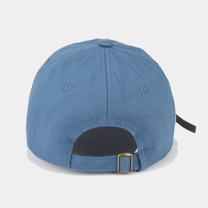 Detail view of the adjustable metal buckle and strap on back of foggy blue baseball cap