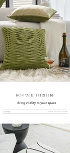 Detailed view of textured pleated olive green and geometric patterned sofa cushions