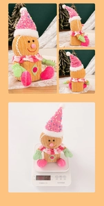 Detail of gingerbread man figurine showing corduroy fabric texture and 6.8g weight on scale