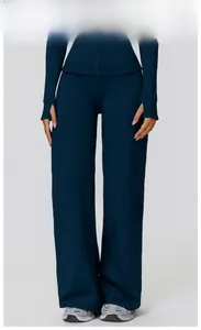 Close-up of badge blue high waisted wide leg sports pants with premium elastic fabric