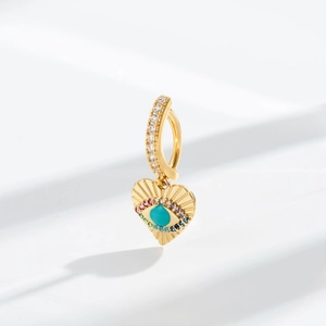 Bohemian gold navel piercing with heart pendant and colorful turquoise evil eye design