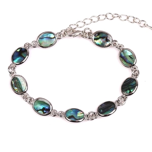 Abalone shell cross heart bracelet in silver with colorful natural shell inlays
