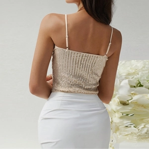 Champagne gold sequin camisole with thin straps and an open back for vacation wear