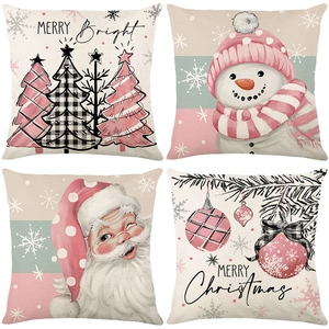 Set of four Christmas linen pillow covers with festive snowman and tree prints