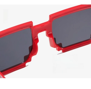 Close-up of integrated nose pad on red pixelated sunglasses for comfortable fit