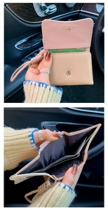 Detail view of pink and beige PU leather wallet with card slots and wrist strap