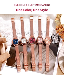 Detail view of five square dial watches with rose gold mesh bands on lifestyle background