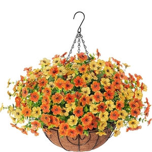 Close-up of hanging basket with artificial orange flowers, metal chain and coconut liner
